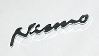 Шильд - эмблема в решетку Nissan "Nismo"