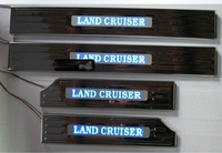 Накладки на пороги дверей с подсветкой Toyota Land Cruiser 200 (широкие)