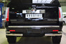 Защита заднего бампера Cadillac Escalade 2007- d76-d42 (уголки)