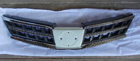 Решетка радиатора Nissan Tiida 08-11