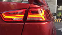 Тюнинг стопы Mitsubishi Lancer X "Audi style" красные
