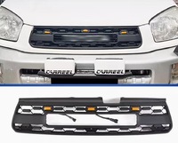 Решетка радиатора тюнинг с огнями Toyota Rav4 2000-2003