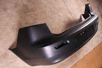 Бампер задний Mitsubishi Lancer 07-11