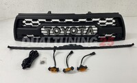 Решетка радиатора тюнинг LED с огнями Toyota Surf 185
