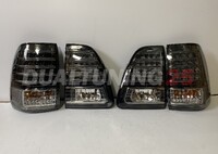 Стопы Toyota Land Cruiser 100 1998-2007 (стиль Lexus) дымчатые