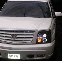 Передняя альтернативная оптика (фары) «Eagle Eyes» на Cadillac Escalade #2