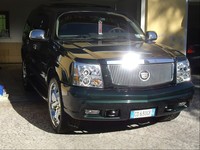 Передняя альтернативная оптика (фары) «Eagle Eyes» на Cadillac Escalade