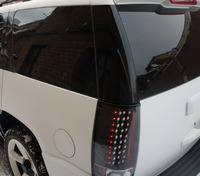 Задние альтернативные фонари стопы (оптика) «Eagle Eyes» на Cadillac Escalade 