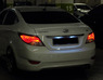 Стопы (фары) «BMW Design» для Hyundai Solaris 2010+ (дымчатые, красные)