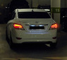 Стопы (фары) «BMW Design» для Hyundai Solaris 2010+ (дымчатые, красные)