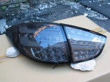 Стопы (фары) «BMW Design» для Hyundai Tucson Ix35 (дымчатые)