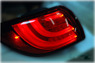 Стопы (фары) «BMW Style» Kia Sportage 3 R (тонированные, красные)