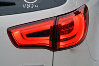 Стопы (фары) «BMW Style» Kia Sportage 3 R (тонированные, красные)