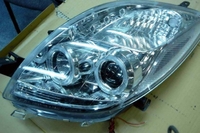 Фары (оптика) линза Toyota Vitz / Yaris 2005-2008 (хром) TYC